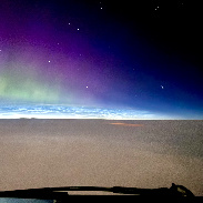 <font class="tempImageTitleThumbText">Purple Aurora And Noctilucent Clouds</font><br>Brian Whittaker<br>Jul 4 4:31pm<br>NW Atlantic Ocean 40,000 ft (N5