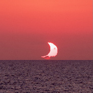 <font class="tempImageTitleThumbText">Sun Setting After Totality</font><br>Chria Brown<br>Sep 9 1:32am<br>Holland America 40 N 1.5 E